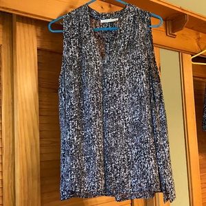 Sleeveless black and white top, size large.